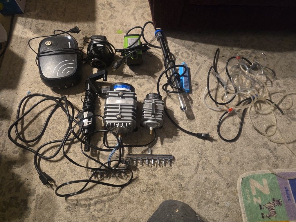 2 Air Pumps Aquarium Heater And A Water Pump