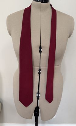 vintage Givenchy Gentleman tie, commonly crafted from a silk or rayon-silk blend