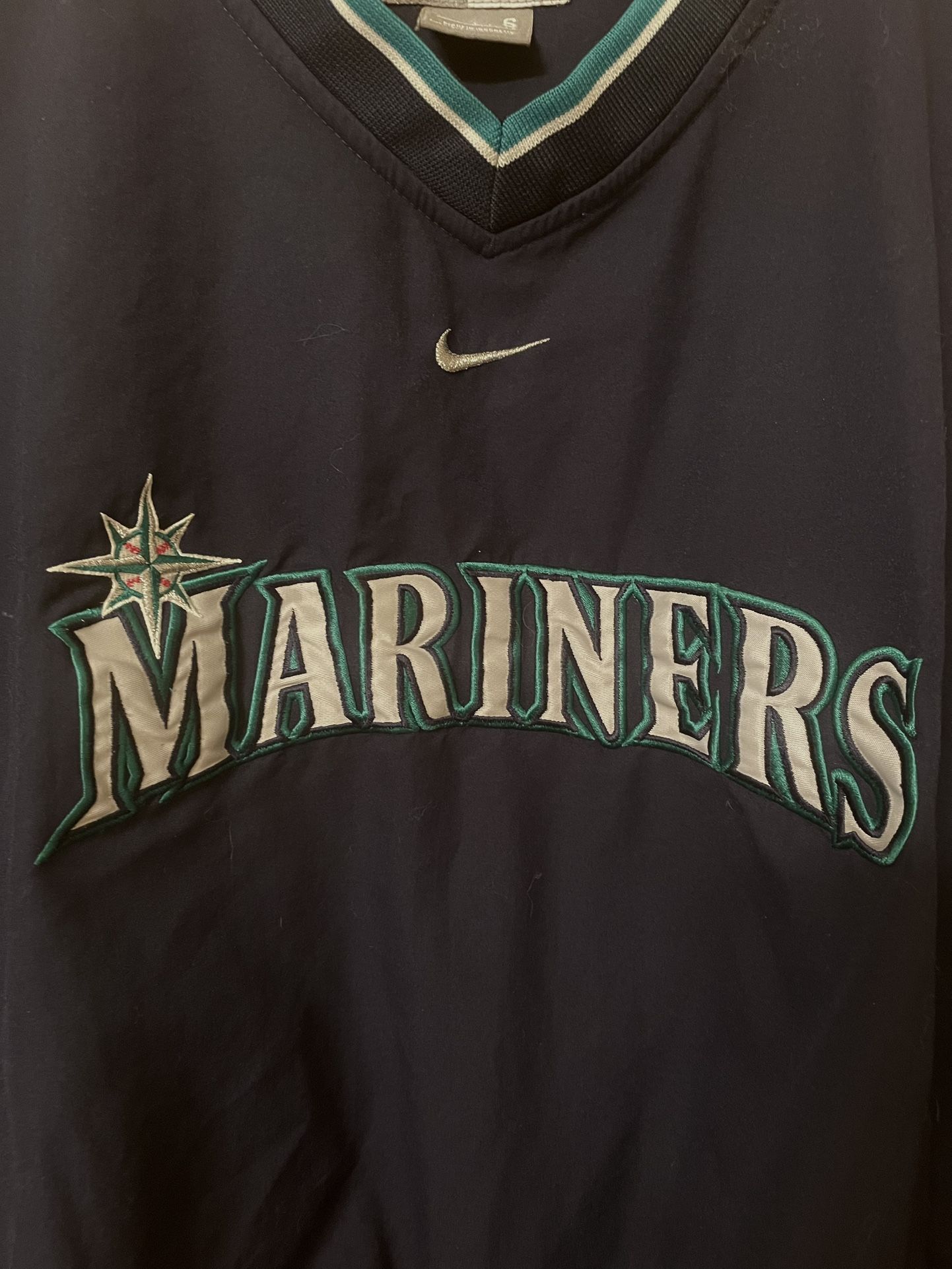 Two sports jackets, one Mariners one Rainiers