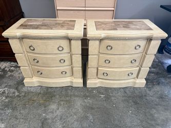 Pair of ornate traditional, three drawer nightstands with marble tops