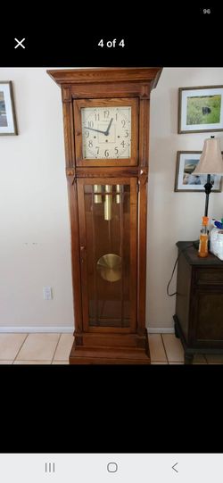 Gorgeous grandfather clock. Purchased from Ashley's a decade ago.  Works as https://offerup.com/redirect/?o=Z29vZC5hcy5uZXc=.