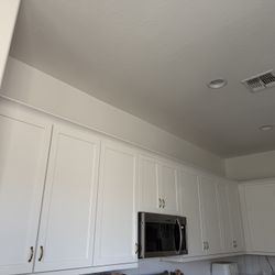 Entire Section Of Upper White Shaker Cabinets