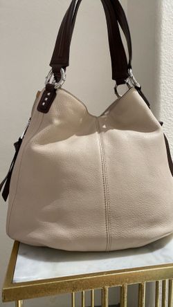 authentic Aimee Kestenberg pebbled leather handbag featuring a distinctive neutral colorblock design.