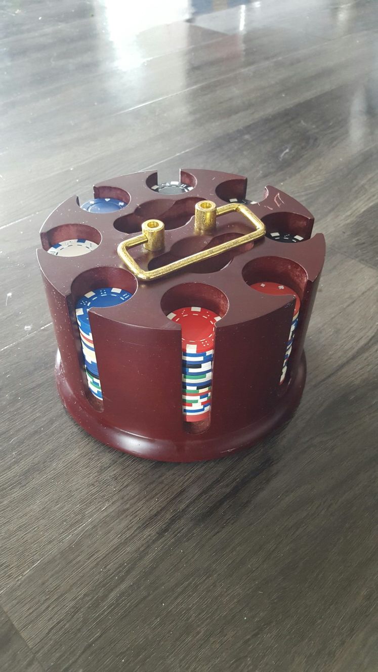 Poker chip set in wooden carousel