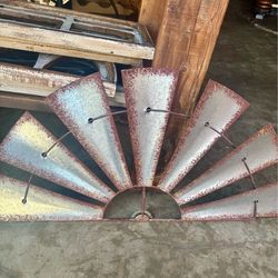 Metal windmill wall decor