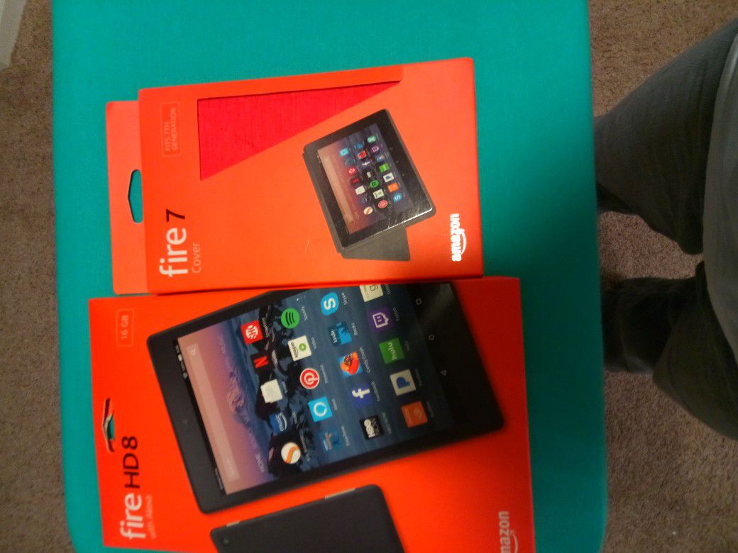 New never been opened Amazon fire HD 8 16GB tablet and Amazon fire 7 case.