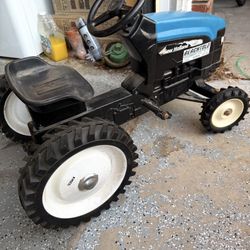 ERTL NEW HOLLAND  LP Tractor In Good Shape 