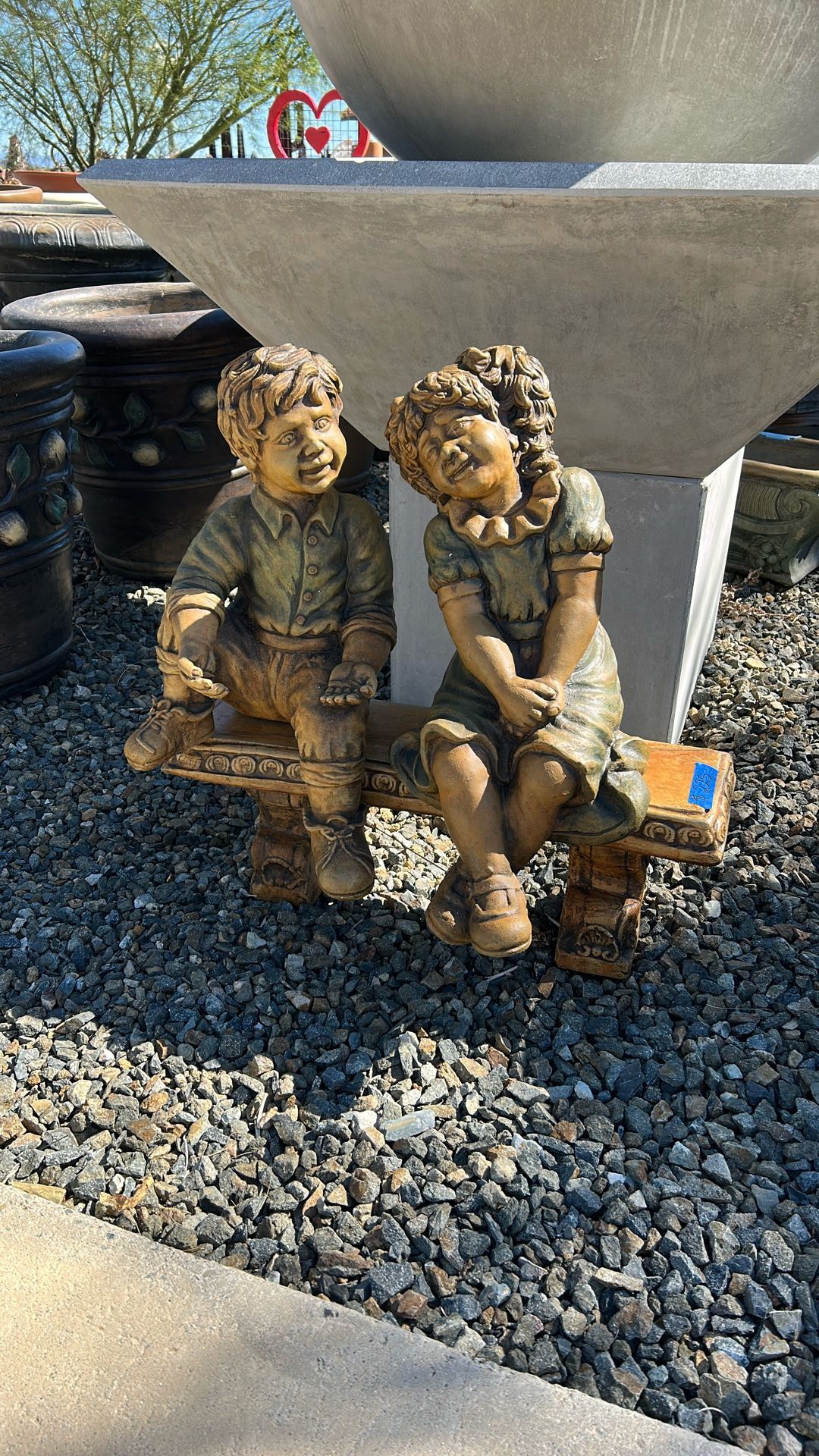 Boy And Girl Statues 
