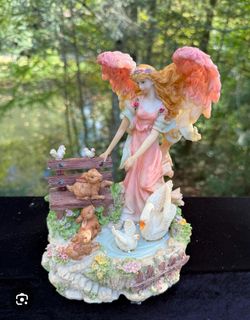 Vintage Collectable Angel Musical Figurine  Plays Angels We Have Heard On High". 