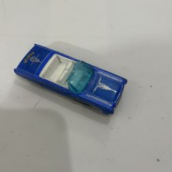 Hot Wheels '64 Lincoln Continental die-cast collectible car.