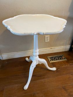 Antique white pedestal table