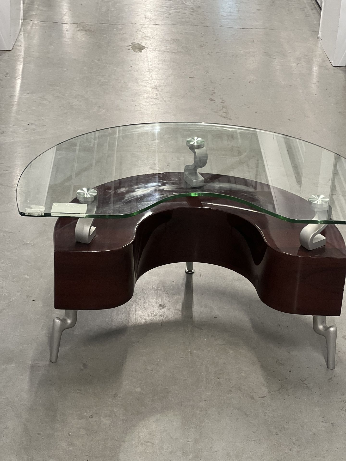 Contemporary Wood Base Coffee Table with Glass Top,Silver and Brown. Used in good condition with some minor cosmetic blemishes. These blemishes are in