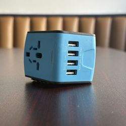 Universal Travel Adapter w/ 4 USB Ports – Works Worldwide