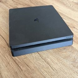 PlayStation 4 Slim 1TB Bundle – Includes Controllers + Wireless Headset