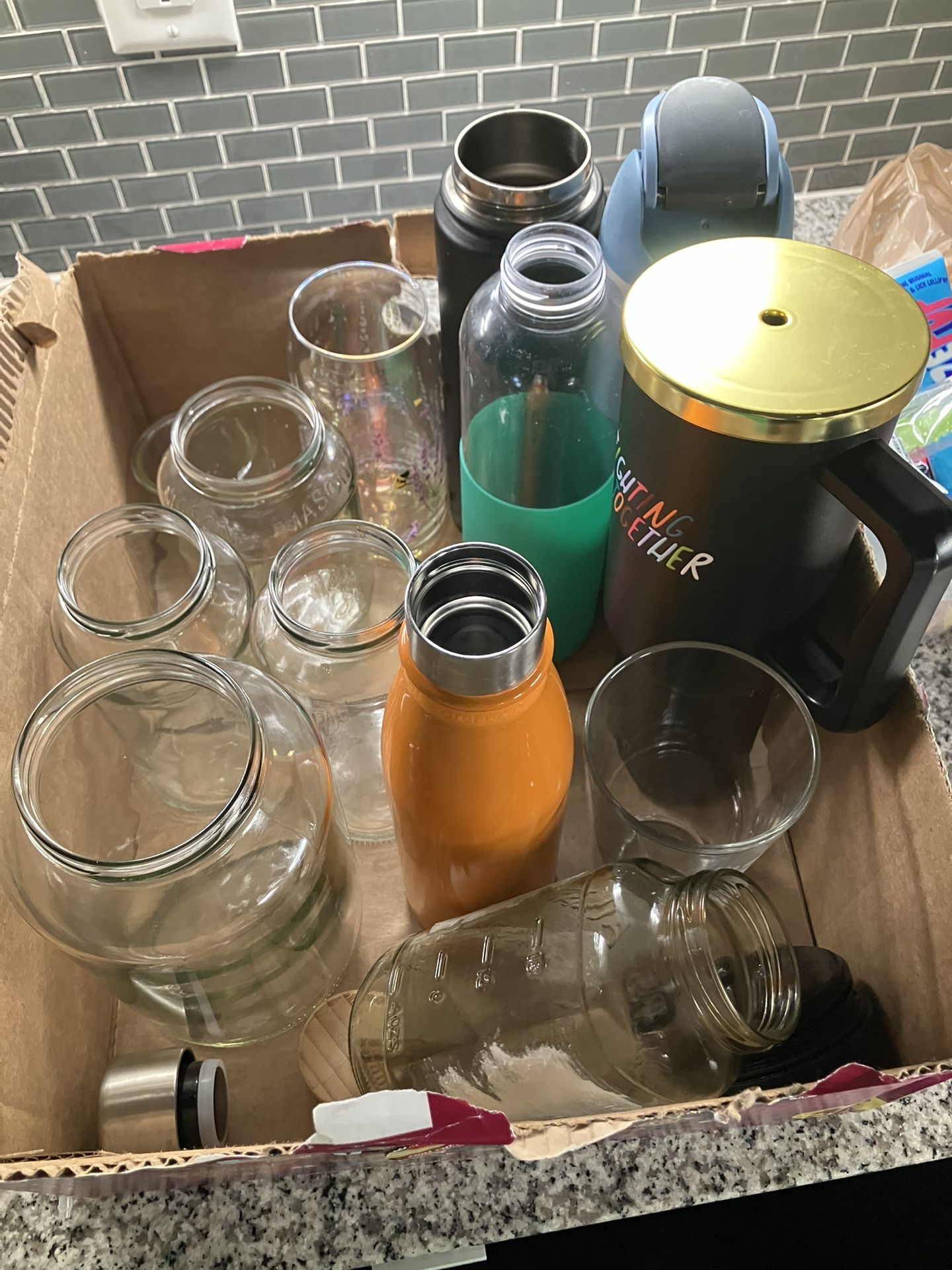 Various Glasses And Sports Bottles Water