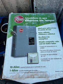 RHEEM tank less water heater