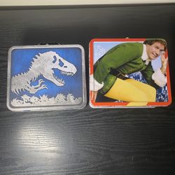 Jurassic Park & Elf Movie Lunch Box Metal Tins Bundle