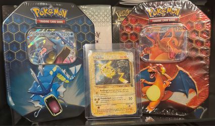 Hidden Fates tin Charizard and Gyarados