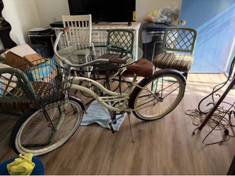 Woman beach cruiser with basket