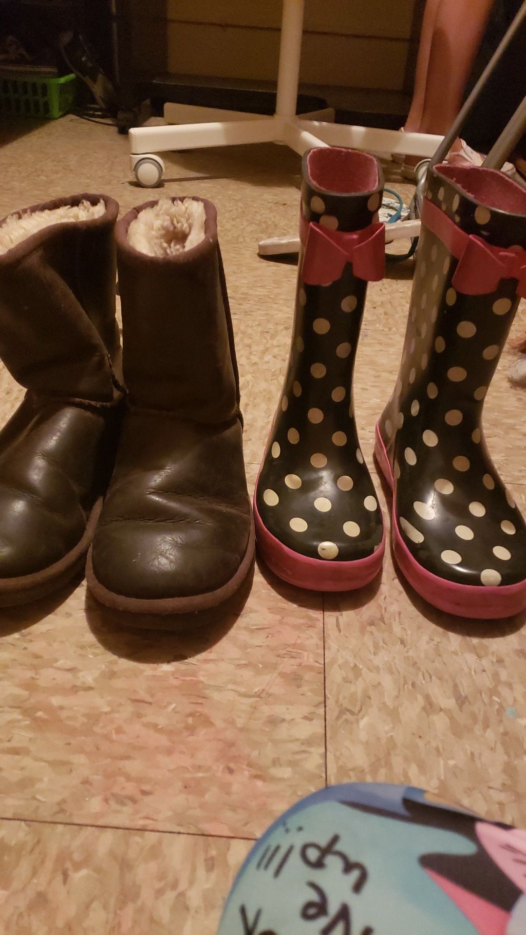 Ugg boots: size 2. Rain boots: size 1. Both in good condition.