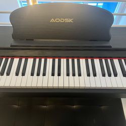 AODSK 88 Key Digital Piano And Seat- Like new 