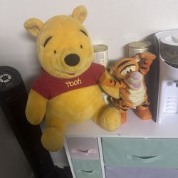 Stuffed animals, Winnie the Pooh, and Tigger