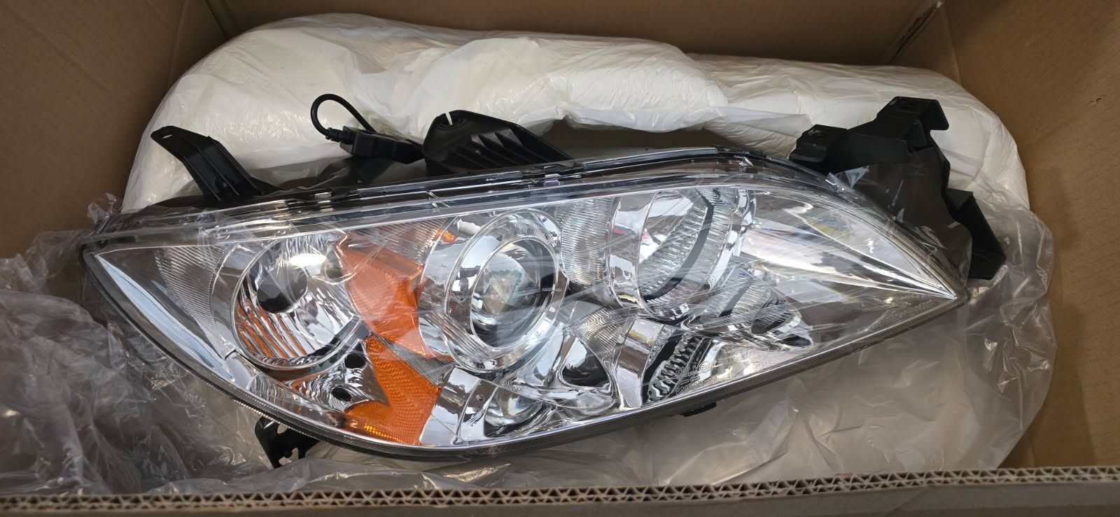 06 Mazda 3 Headlights