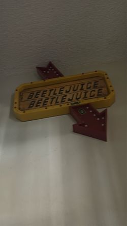 Beetlejuice sign lights up