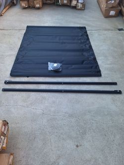 Nissan Titan. 2004/2015 viny soft roll up track bed cover