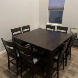 8 seat extendable wood table, counter height,9 piece set