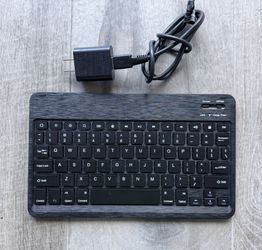 Ultra Thin, Lightweight Portable Bluetooth Keyboard