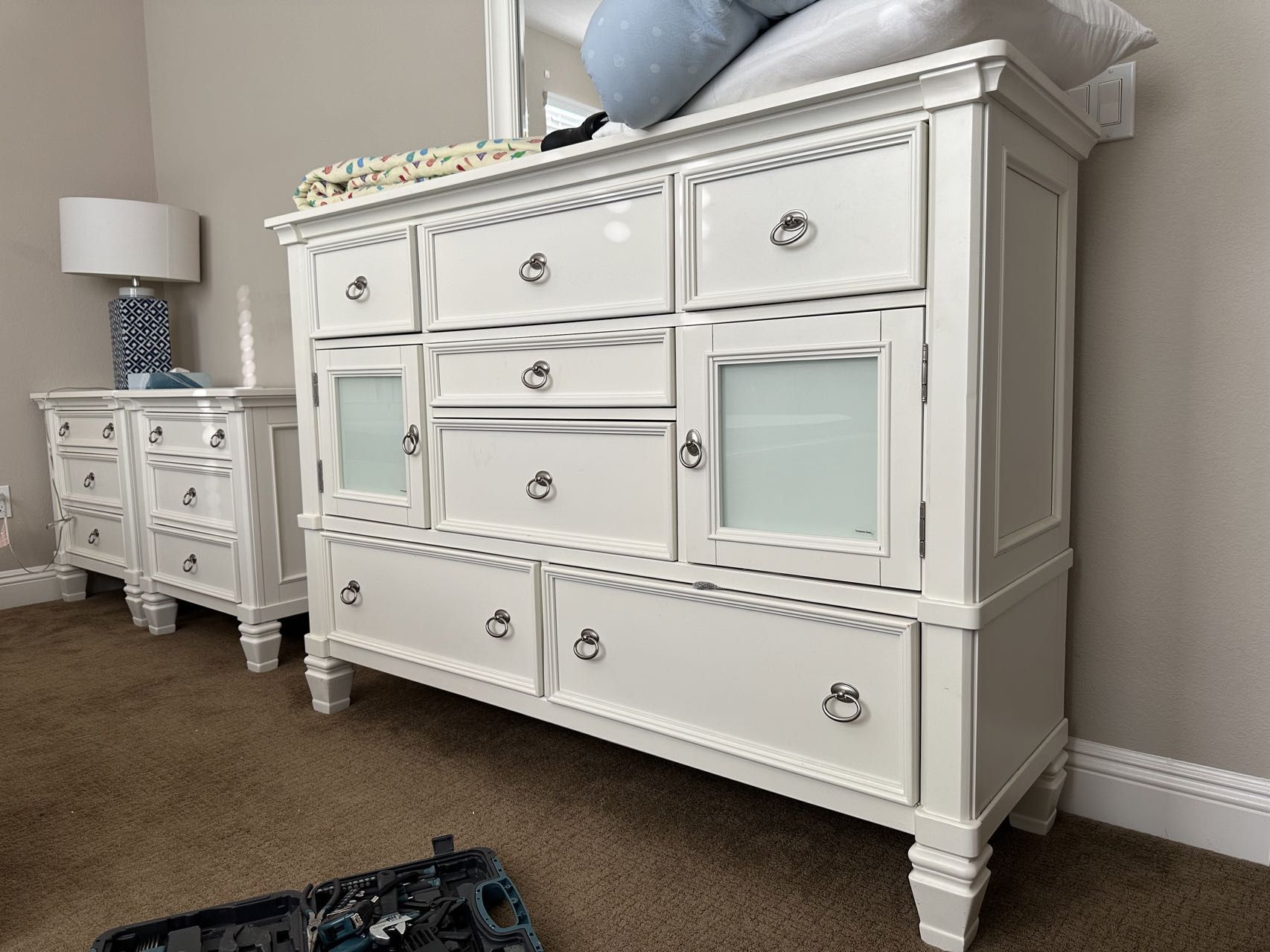 ASHLEY FURNITURE, OFF WHITE DRESSER,7 DRAWERS, 2 DOORS w/ glass