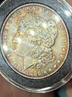 1886-p toner Morgan dollar