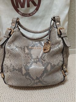 MK skin snake purse