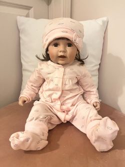 Porcelain Baby Doll with Pink Crown Outfit