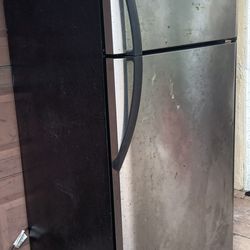 Frigidaire Stainless Steel Fridge. Clean. Works Well. No Issues