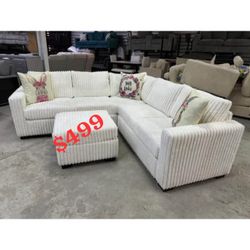Cream color corduroy sectional sofa with ottoman