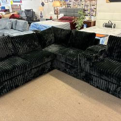 Black Sectional With Ottoman