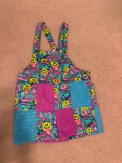 Playful patchwork overalls with neon smiley faces. Colorful swirl print with bold accents. Bundle deals available please check out my other items and 