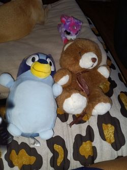 Bluey plushie, teddy bear and a purple unicorn