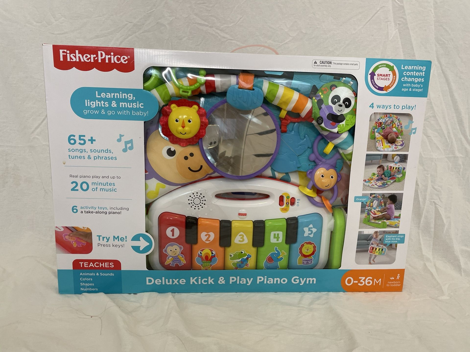 Fisher-Price Deluxe Kick & Play Piano Gym