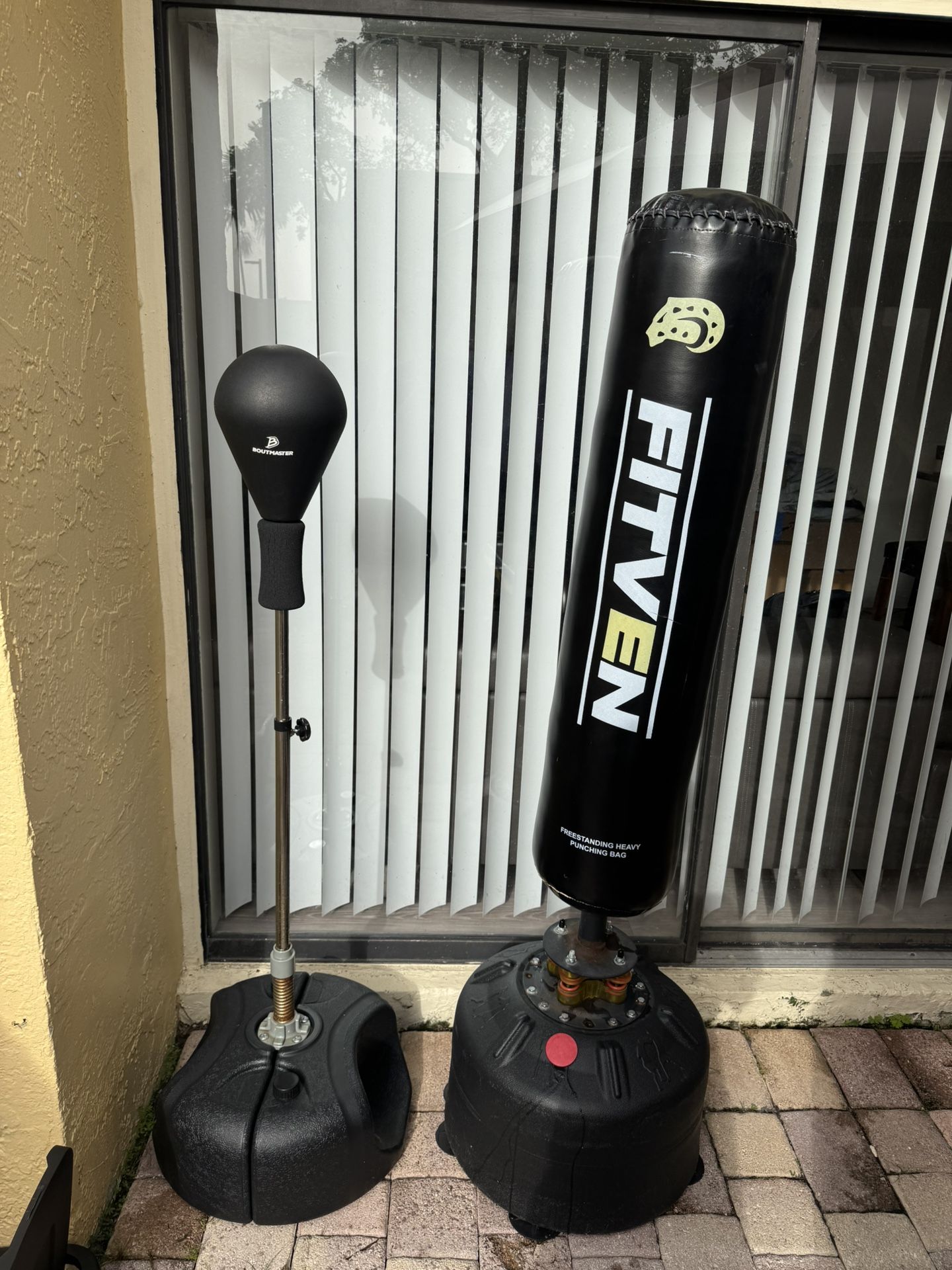 Heavy punching bag/ speed adjustable freestand reflex bag