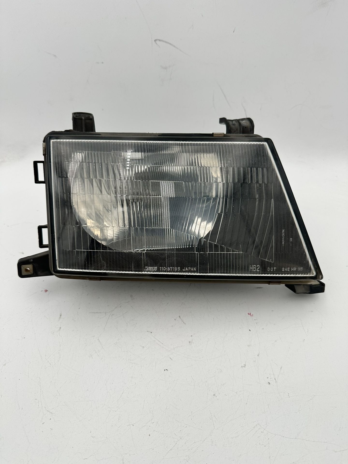 97 to 99 Mitsubishi Montero OEM Right Passenger Side Headlight Lamp