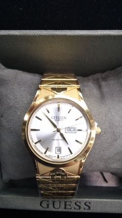 Citizens Ladies Oval Gold Tone Watch with Date