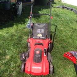 Lawn Mower And Widdow