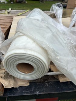 Oil spill pads and absorbing materials
