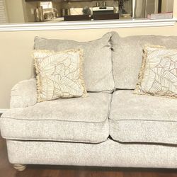 Beige sofa and loveseat like new