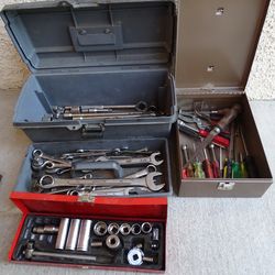 3 tool boxes with tools
