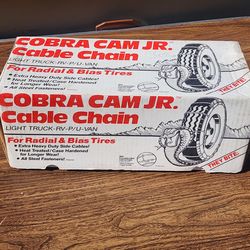 TIRE CHAINS new in box