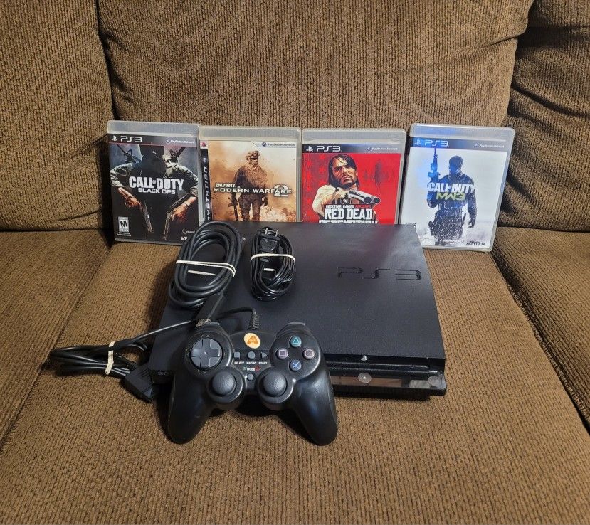 PS3 Bundle with 4 games and controller